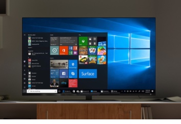 Large TV screen showing Windows OS